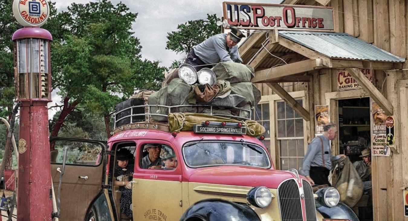 During the early years of Pie Town, a car—known as the stagecoach—made a round trip daily through town, stopping at Harmon Craig’s store and post office to drop off mail. The stagecoach brought a crowd each day. PHOTO  COURTESY OF RUSSELL LEE PHOTO
