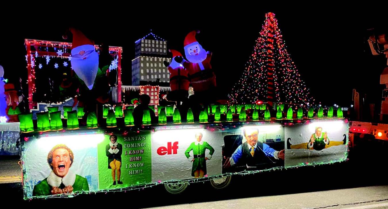 Farmers’ Electric participates the Clovis Christmas light parade.