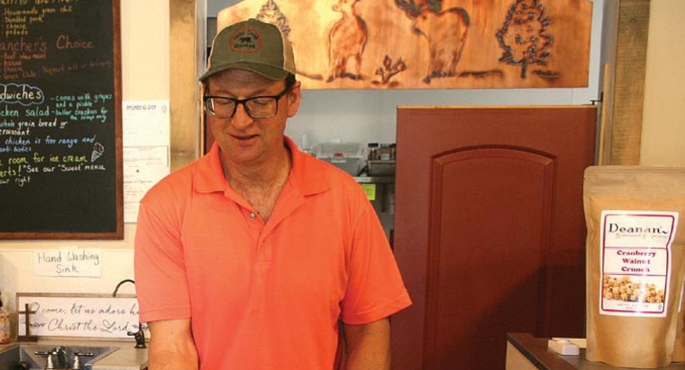 Ron Starr handles a batch of ice cream sammie cookies. Beware: The UFI team may strike near you! Watch for the next  enchantment installment to highlight New Mexico’s finest local eateries. Feel free to recommend  spots for the team to investigate.