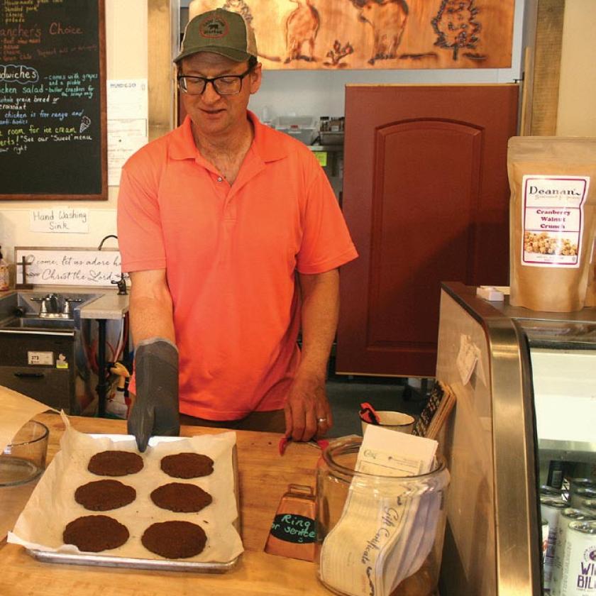 Ron Starr handles a batch of ice cream sammie cookies. Beware: The UFI team may strike near you! Watch for the next  enchantment installment to highlight New Mexico’s finest local eateries. Feel free to recommend  spots for the team to investigate.